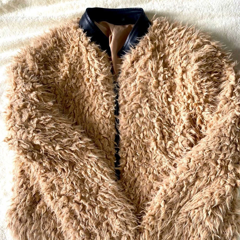 Pinky beige furry jacket with faux leather trim